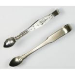 A pair of George III silver bright cut sugar tongs, London 1799 and another pair 1809, 73gm