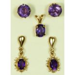 Two pairs of 9ct gold mounted amethyst ear rings and a matching pendant, 3gm