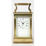 L' Epee, a French brass carriage clock, the signed white enamelled dial with Roman