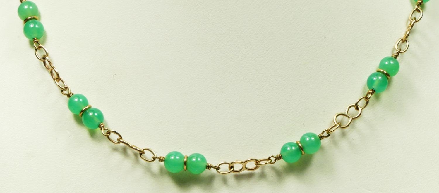 A 9ct gold and chrysoprase bead necklace, 45cm, 10.8gm