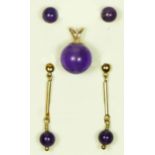 A 9ct gold mounted amethyst bead pendant, 10mm, and two pairs of amethyst ear rings