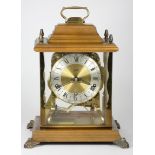 A Schatz German mantel clock, c1950s, having steeped base with removable upper section, brass framed