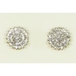 A pair of 9ct gold and diamond cluster ear studs, each set with 37 single cut stones, 2.1gm