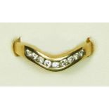 A 9ct gold and brilliant cut diamond channel set ring, stated weight 0.25cts, M, 2gm