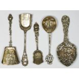 A Victorian cast silver heart shape spoon, Birmingham 1895, and four Low Countries silver decorative