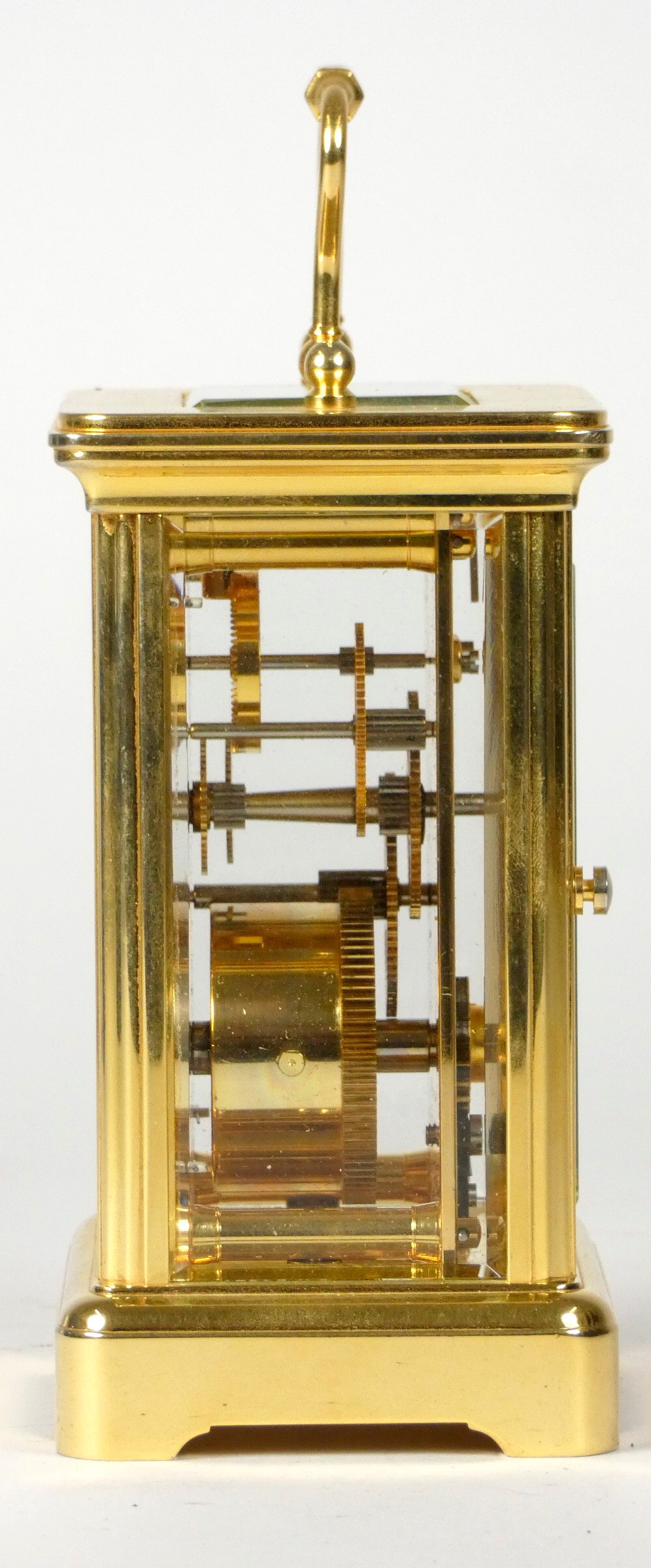 An English 8 day carriage clock, brass cased, bevel edged glass panels with enameled dial and - Image 3 of 4
