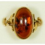 A 9ct gold and amber dress ring, 17 x 10mm, N, 2.9gm