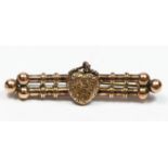 A Victorian 9ct rose gold double bar brooch with textured heart motif, by WGM, 47mm, 3.5gm