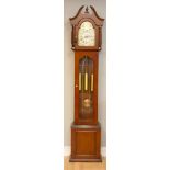 A modern westminster chime longcase clock, the mahogany case with brass arch dial embossed gilt