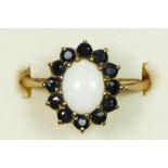 A 9ct gold opal and sapphire cluster ring, P, 1.9gm