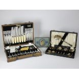 A canteen of chrome plated cutlery, complete, retailed by Skinner & Robinsons of Doncaster, wooden