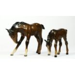 Beswick, a brown pony, 11cm and foal, 9cm