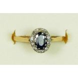 A 9ct gold sapphire and diamond cluster ring, F 1/2, 1.4gm