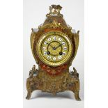 A 19th century French Boule striking bracket clock, having gilt dial with porcelain roman