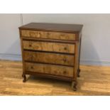 A late 20th century chest of drawers, false top drawer, hinged top opens to reveal a mirrored and