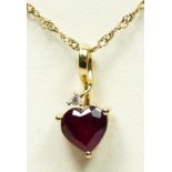 A 9ct gold heart shape ruby and brilliant cut diamond heart pendant, stone 7 x 7mm, 1.9gm