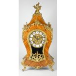 A late 19th century Louis XVI style Boule mantel clock, inlaid walnut case with applied embossed