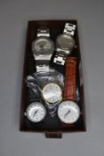 A small selection of wrist watches of various brands including Kenneth Cole, Sekonda, Fishbone etc