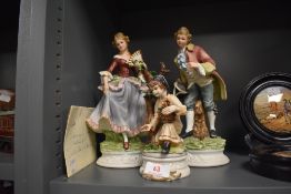 A selection of figures and figurines including Capodimonte Autumn girl
