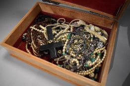 A box containing selection of costume jewellery