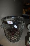 A clear cut crystal glass wine or champagne cooler
