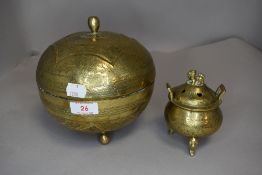 Two middle eastern style brass wares including incense Koro and lidded bowl