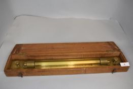 A vintage architects or map readers sliding rule in brass with case by J.Haldon and co Manchester