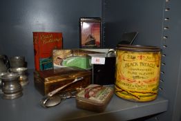 A selection of collectable transfer printed advertising tins