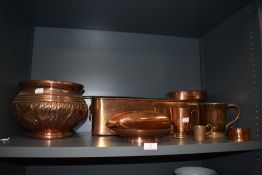 A selection of copper wares including large impressed planter