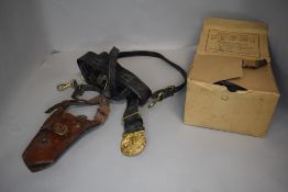 A WW2 Gas Mask in original card box, a leather Bayonet Holster and a leather Royal Navy Belt and