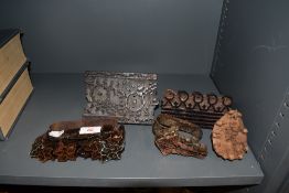 A selection of wooden carved and copper printing stamps