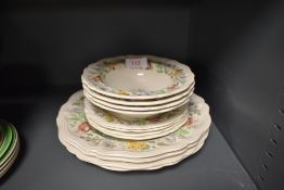 A selection of dinner and dessert plates by Royal Doulton in the Stratford design