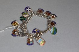 A charm bracelet with charms some marked