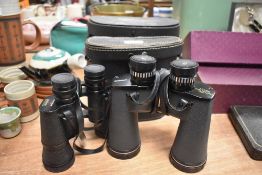 Two pairs of vintage binoculars including Chinon 10x50 and Tecnar 8x40