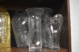 A selection of large standing clear cut glass vase including named brands