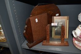 A lovely collection of 1930s art deco photo frames and a 1930s magazine rack having raised west