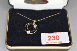 A 9ct gold pendant having double loop pendant having cubic zirconia decoration, approx 0.7g