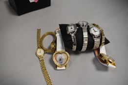 Eight assorted fashion wrist watches including two baring inscription 'Bichon Frises leave pawprints