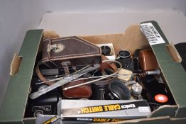 A box of various photographic items including Leica, Vivitar flashgun, Miranda Flashgun Various