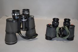 Two pairs of Binoculars including Wray No309 Military Issue with crows foot 6x30 and Miranda 10 x50