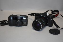 A Pentax P30N with a Pentax A 28-80mm lens and a Pentax EOP 10 838 camera