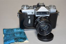 A Zenit E SLR camera with 58mm lens in original cover