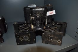 Two Kodak A127 cameras and an ICA Icarette camera
