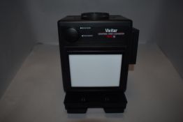 A boxed Vivitar Video convertor