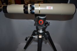 A Bausch and Lomb zoom 60mm Telescope in leather case on a Silk ITV Master tripod