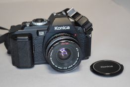 A Konica FS-1 camera with 40mm lens no case