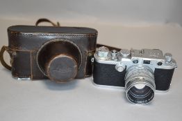 A Leica IIIf camera (656136) with Summarit 50mm lens (1055492) screw mount in original case