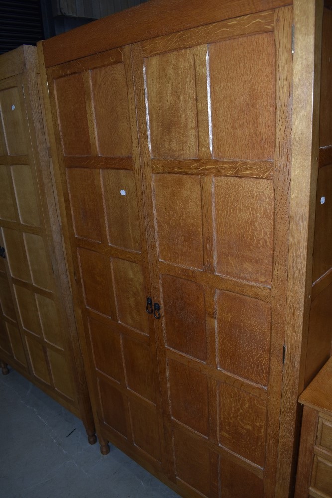 An Arts and Crafts Yorkshire school golden oak bedroom suite by Cat and Mouseman Lyndon Hammell, - Image 5 of 8