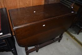 An early 20th Century oak twist gateleg table