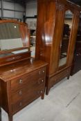 A late Victorian mahogany two piece bedroom suite, comp, mirror door wardrobe, w 106cm and a